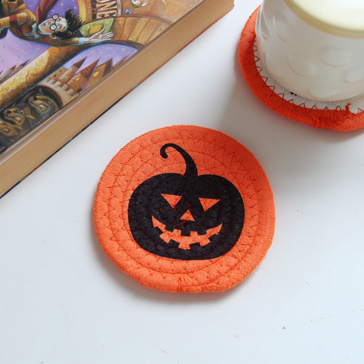 Cotton rope coaster with a jack-o-lantern design