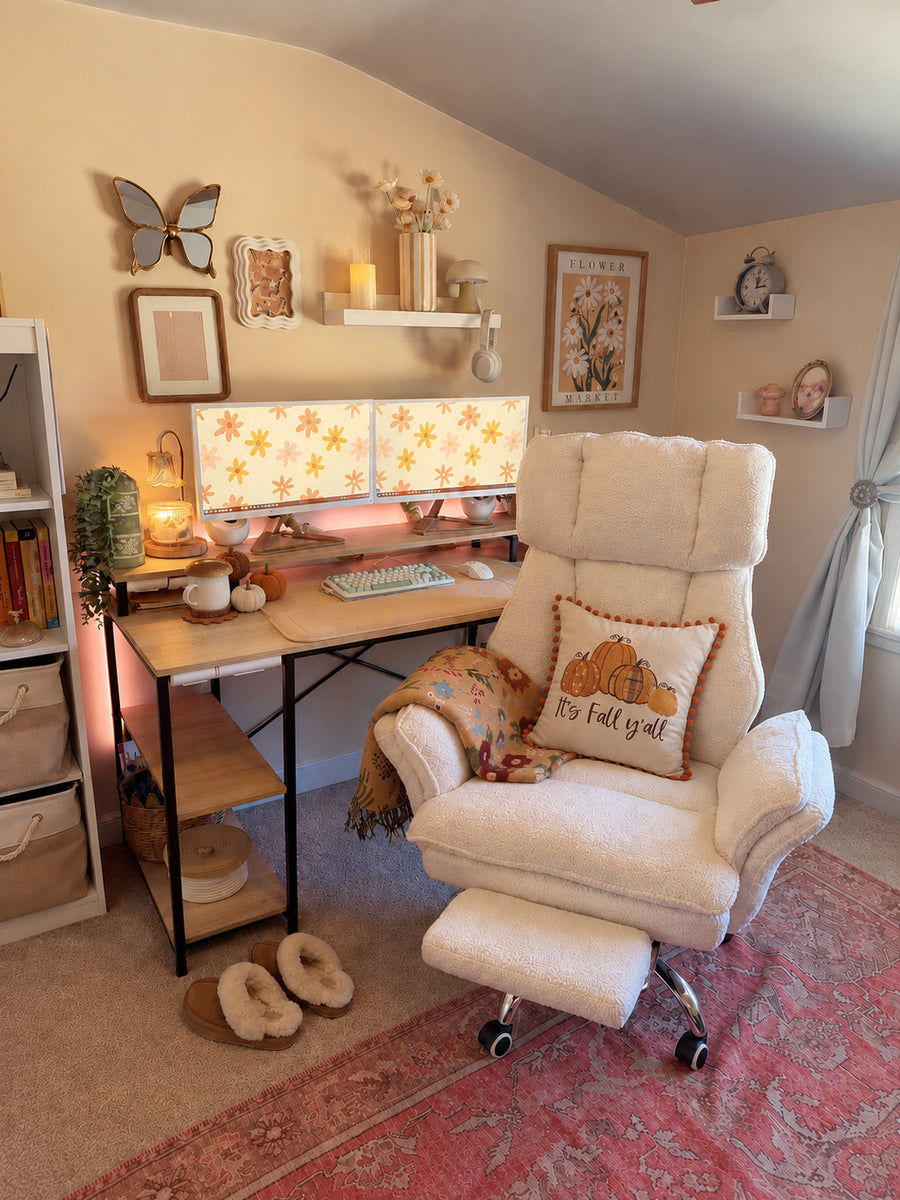 Cozy autumn desk corner with pumpkin pillow covers, acorn coasters and plush pumpkins