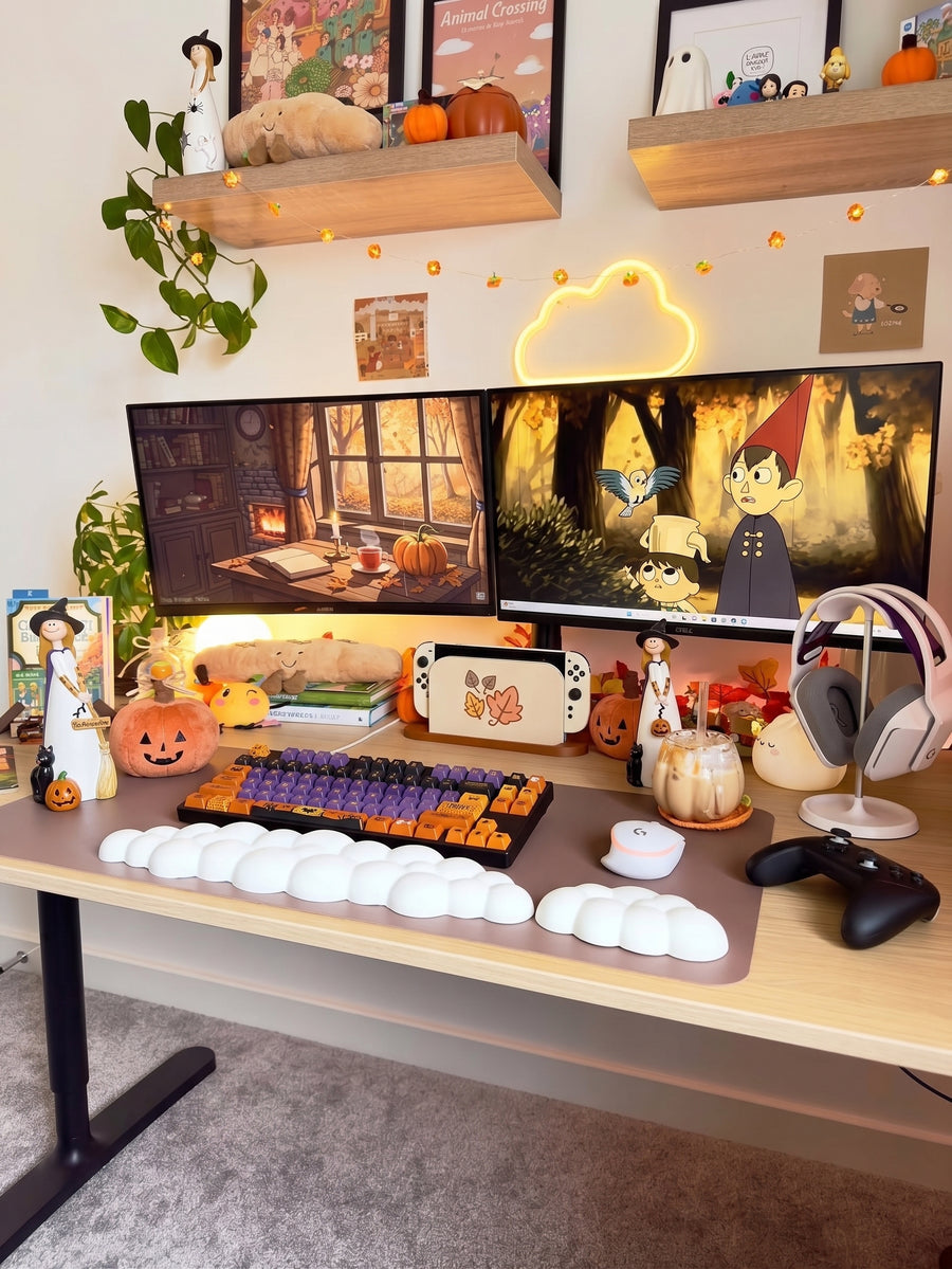 Cute witch desk scene with three witch figurines, Halloween keycaps and autumn decor
