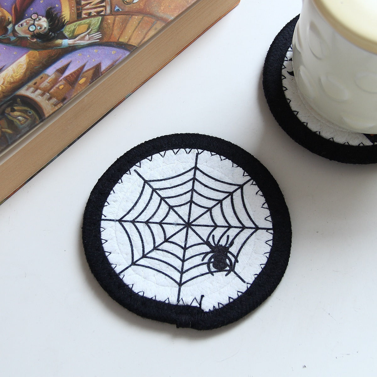 Cotton rope coaster with a spider web design